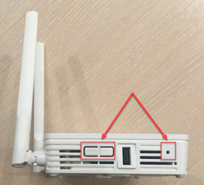 Кнопки WLAN/WPS и RESET на модеме Huawei EchoLife HG8245H5